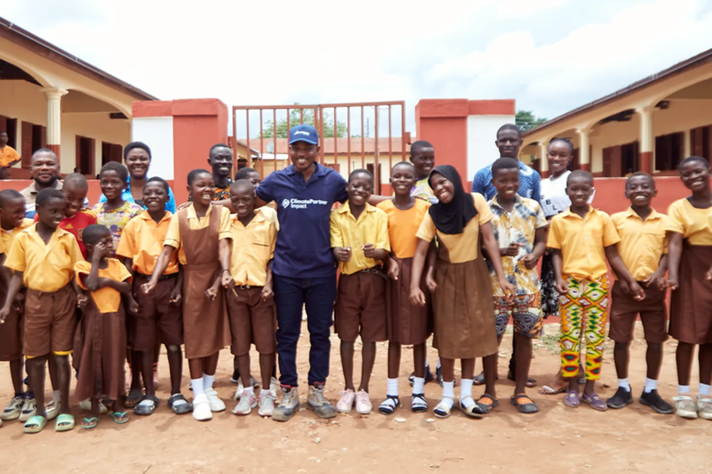 Pupils outside a school supported by EcoPlanet in Ghana