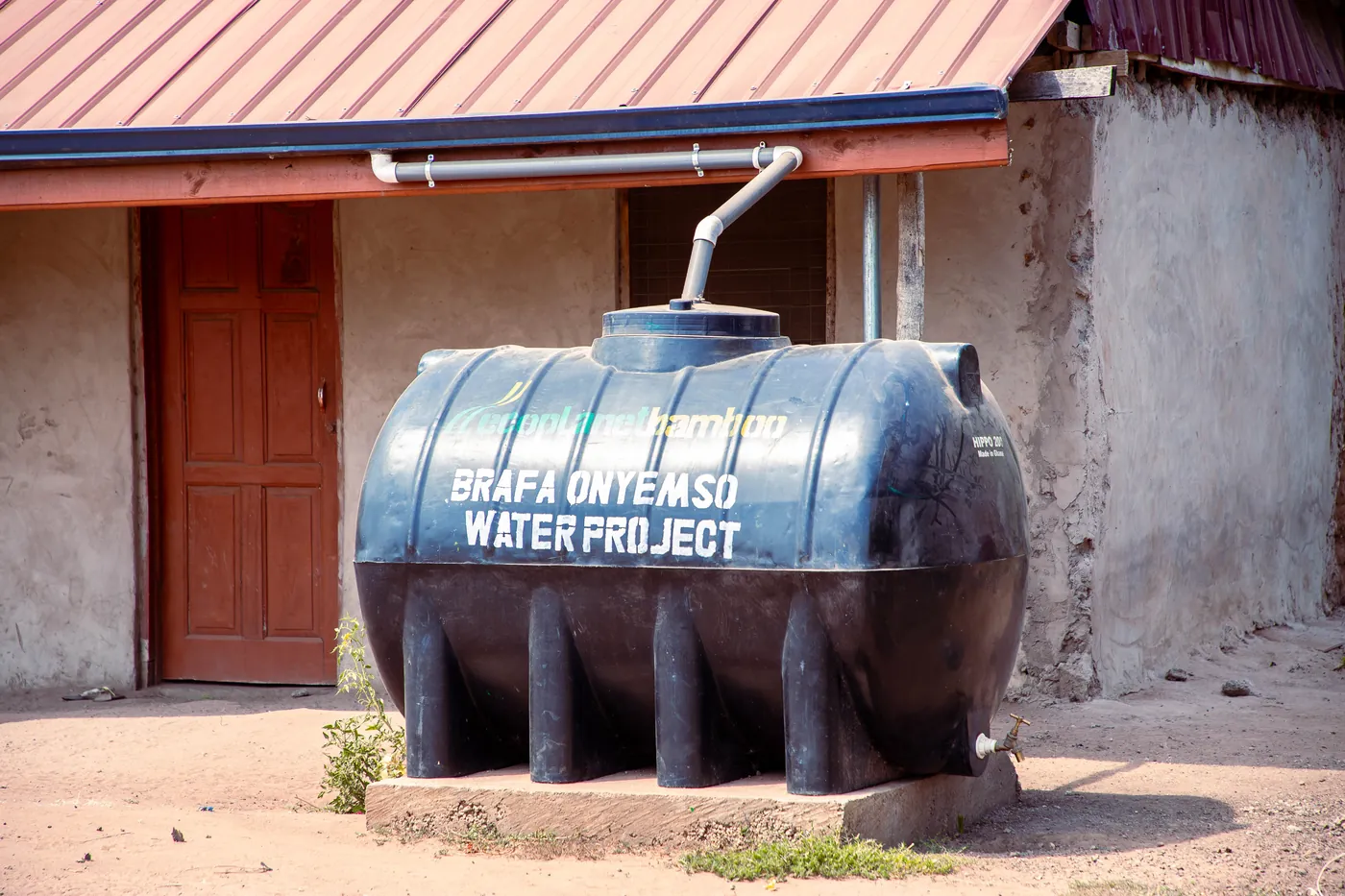 A clean water point built with an EcoPlanet project community