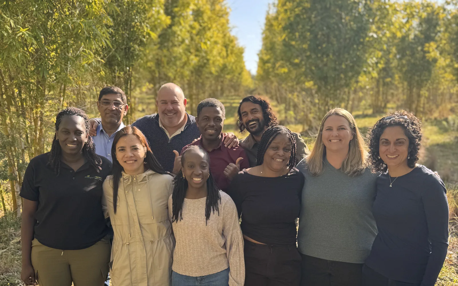 The EcoPlanet global team together in a bamboo grove
