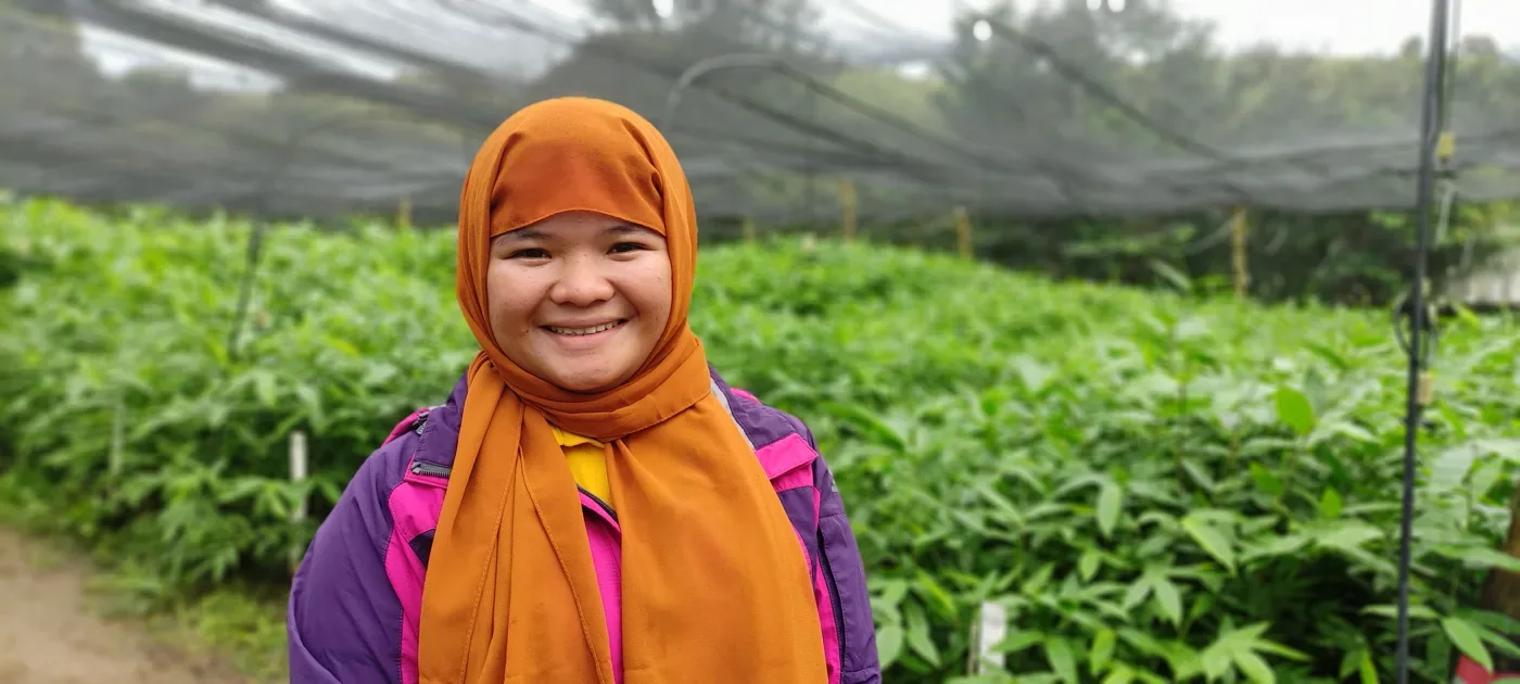 A smiling nursery worker in Lanao del Sur, Philippines