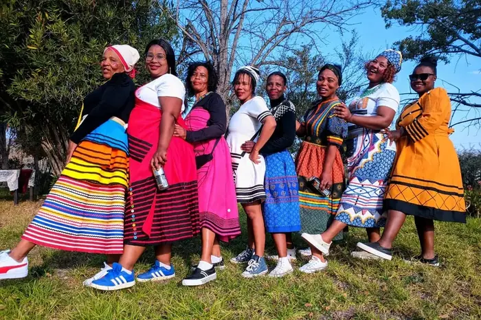 Women of the Pearston team in traditional dress