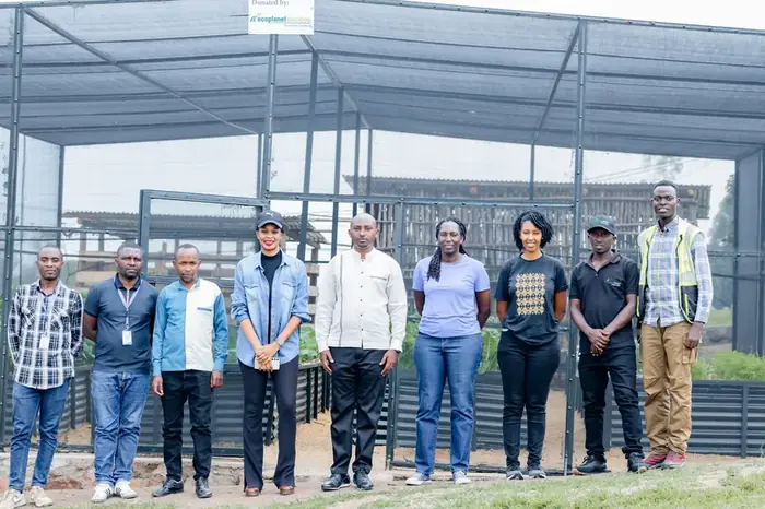 EcoPlanet staff and partners at a community growhouse